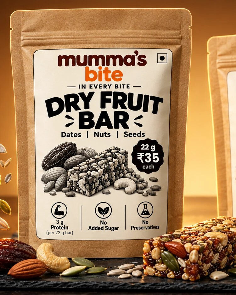 Two Mumma's Bite Dry Fruit Energy Bar pouches with a bar, dates and nuts
